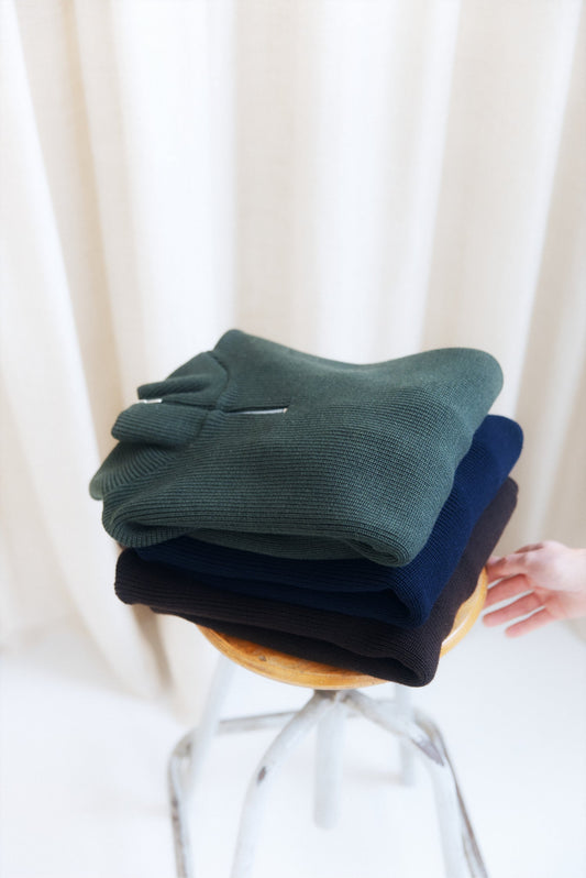 D’où vient le pull camionneur ?